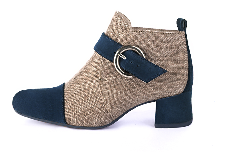 Navy blue and tan beige women's ankle boots with buckles at the front. Round toe. Low flare heels. Profile view - Florence KOOIJMAN